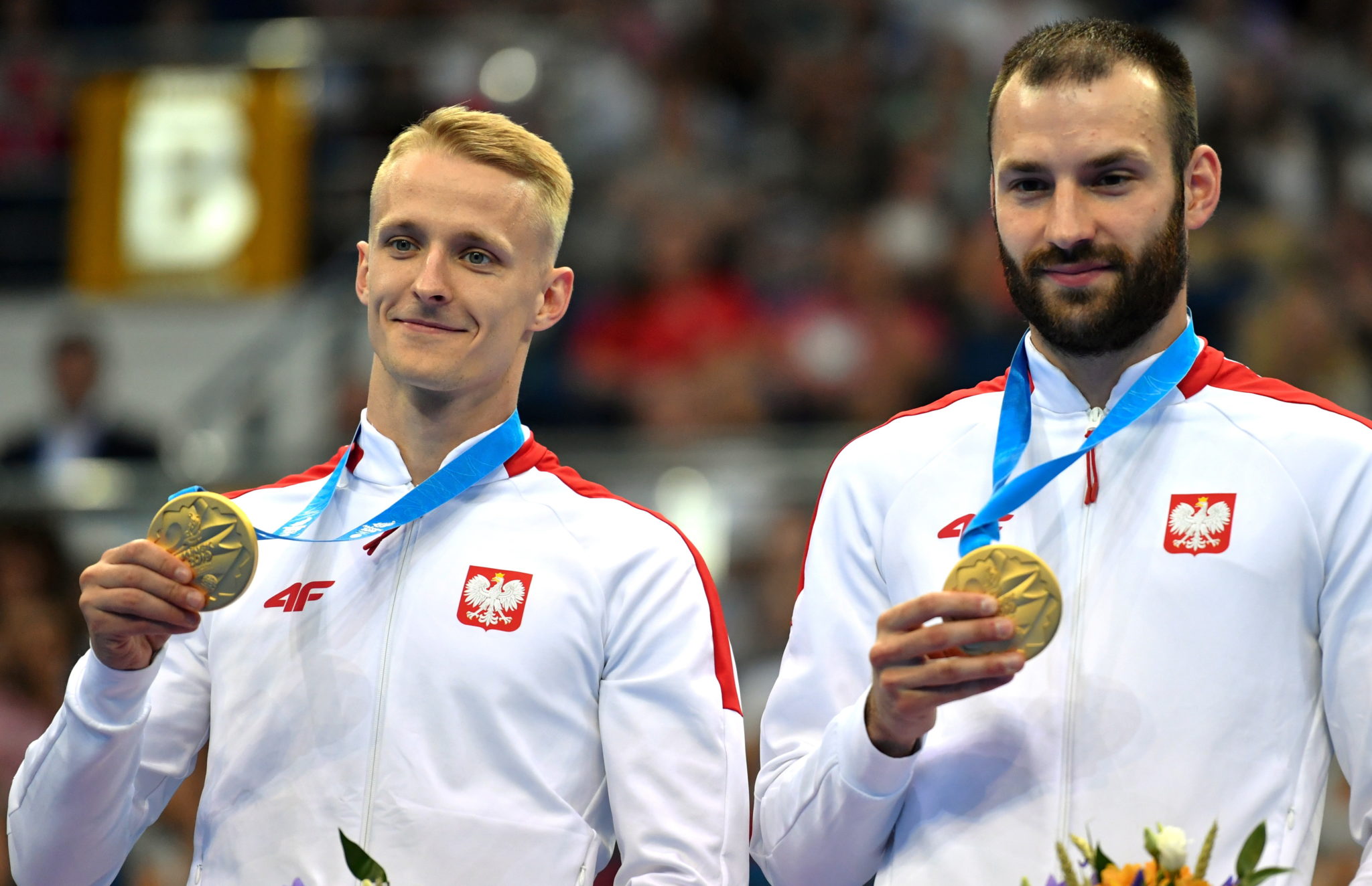 Polacy Łukasz Jaworski i Artur Zakrzewski zdobyli zloty medal w skokach synchronicznych na trampolinie podczas II Igrzysk Europejskich w Mińsk Arenie w Mińsku. To pierwszy medal wywalczony przez biało-czerwonych na tej imprezie, fot. Piotr Nowak, PAP 