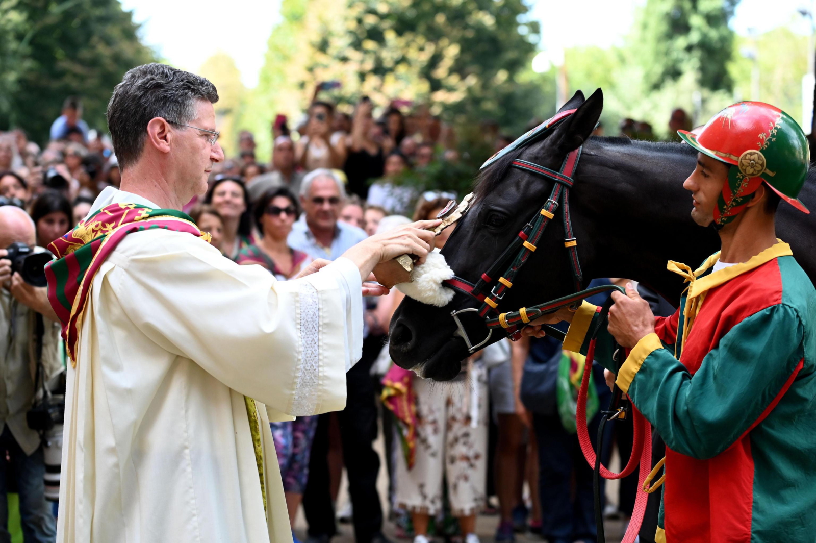 Błogosławienie zwierząt w dniu św. Rocha, Siena, Włochy, EPA/Claudio Giovannini 
