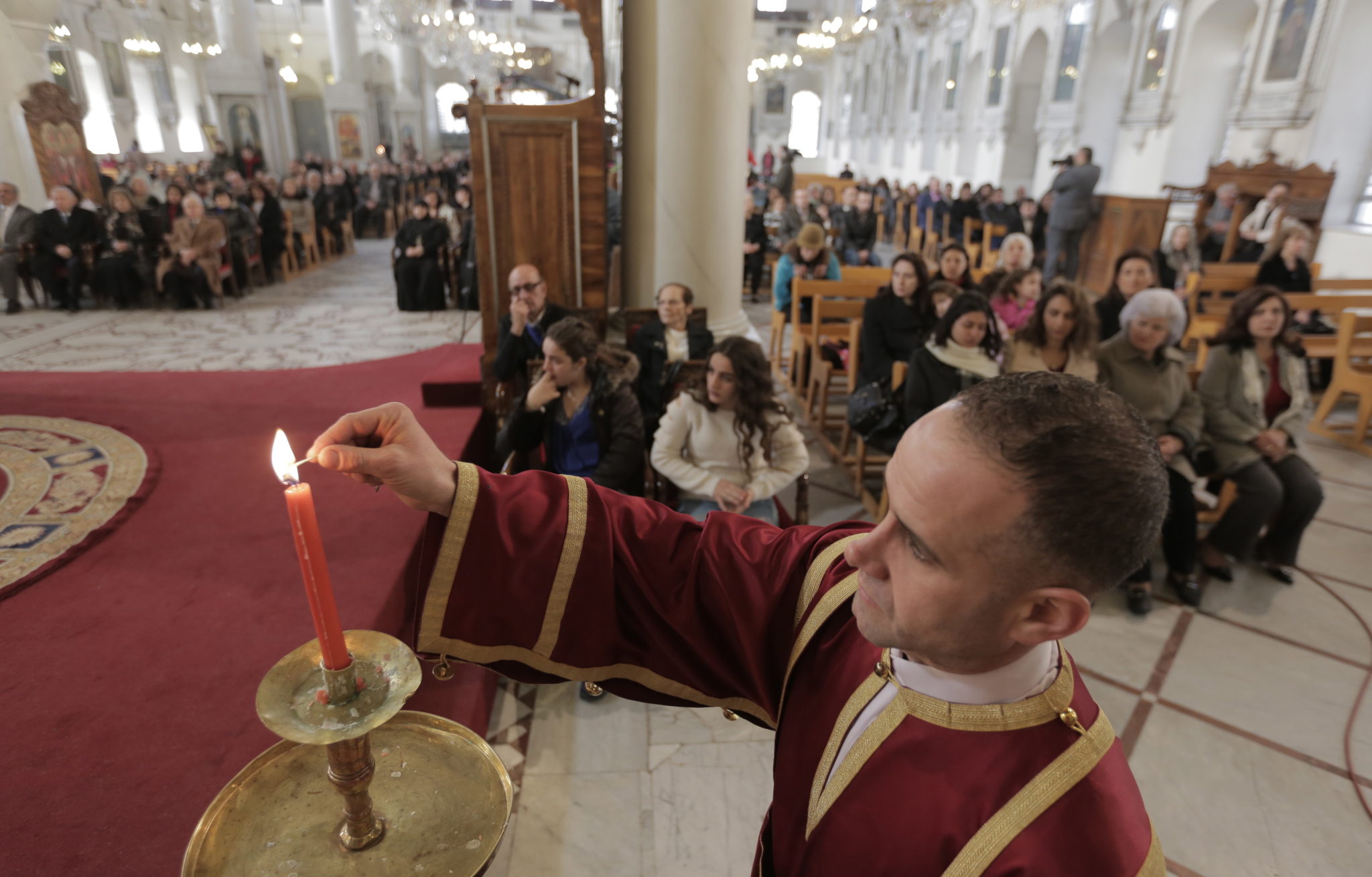 Syria, Damaszek: noworoczna liturgia w greckiej prawosławnej katedrze mariamitów fot. EPA/YOUSSEF BADAWI 