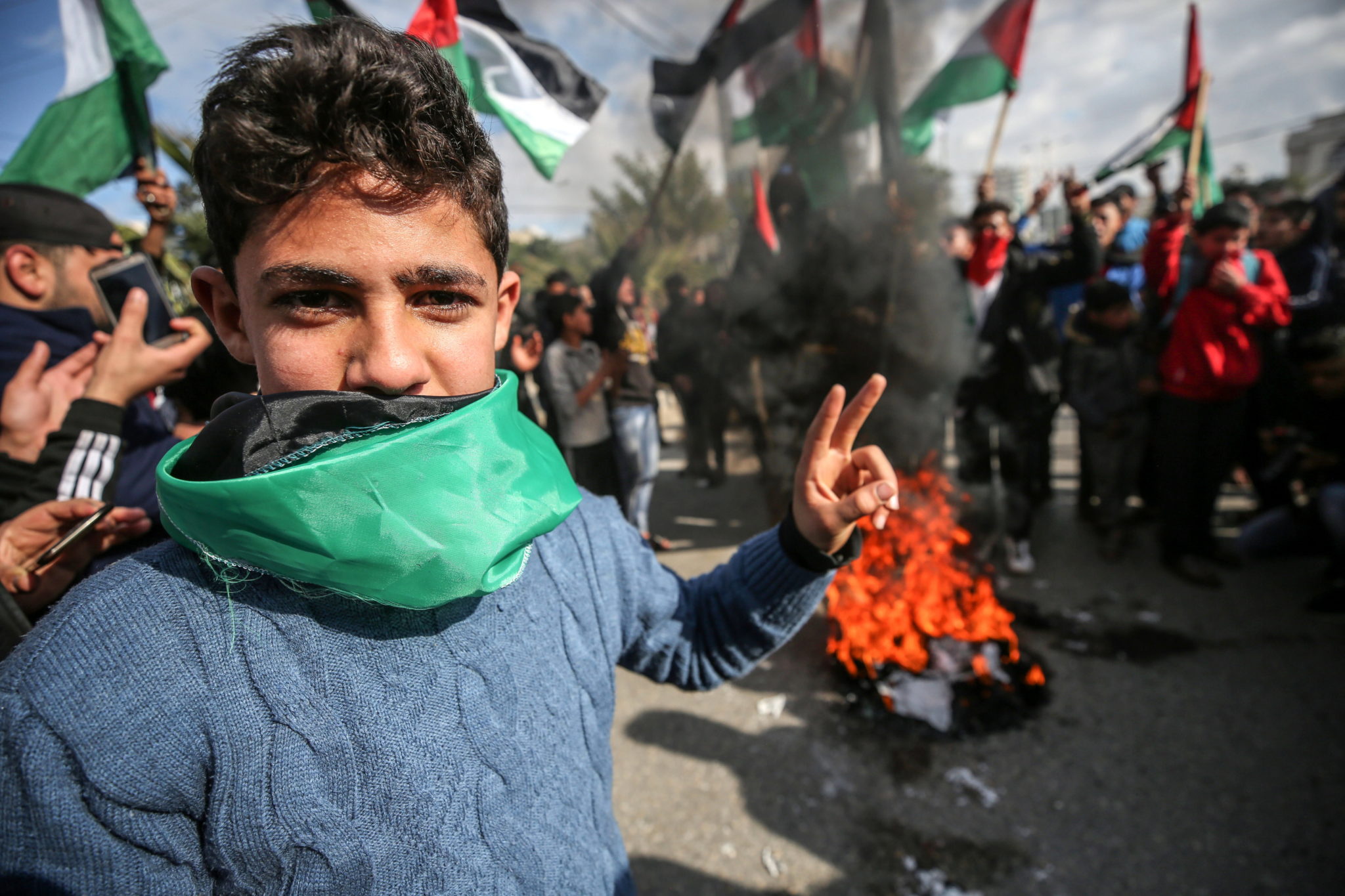 Palestyna: protesty przeciwko tak zwanemu 'Deal of the Century', planowi Donalda Trumpa na rozwiązanie konfliktu między Palestyną a Izraelem. fot. EPA/MOHAMMED SABER 
