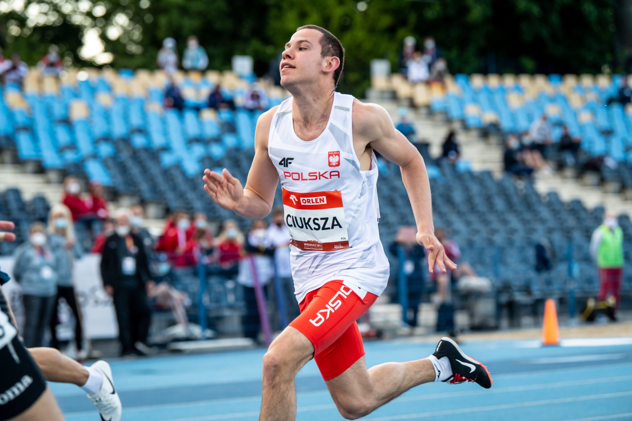 Krzysztof Ciuksza w biegu na 100 m podczas lekkoatletycznych mistrzostw Europy osób z niepełnosprawnościami, fot. PAP/Tytus Żmijewski